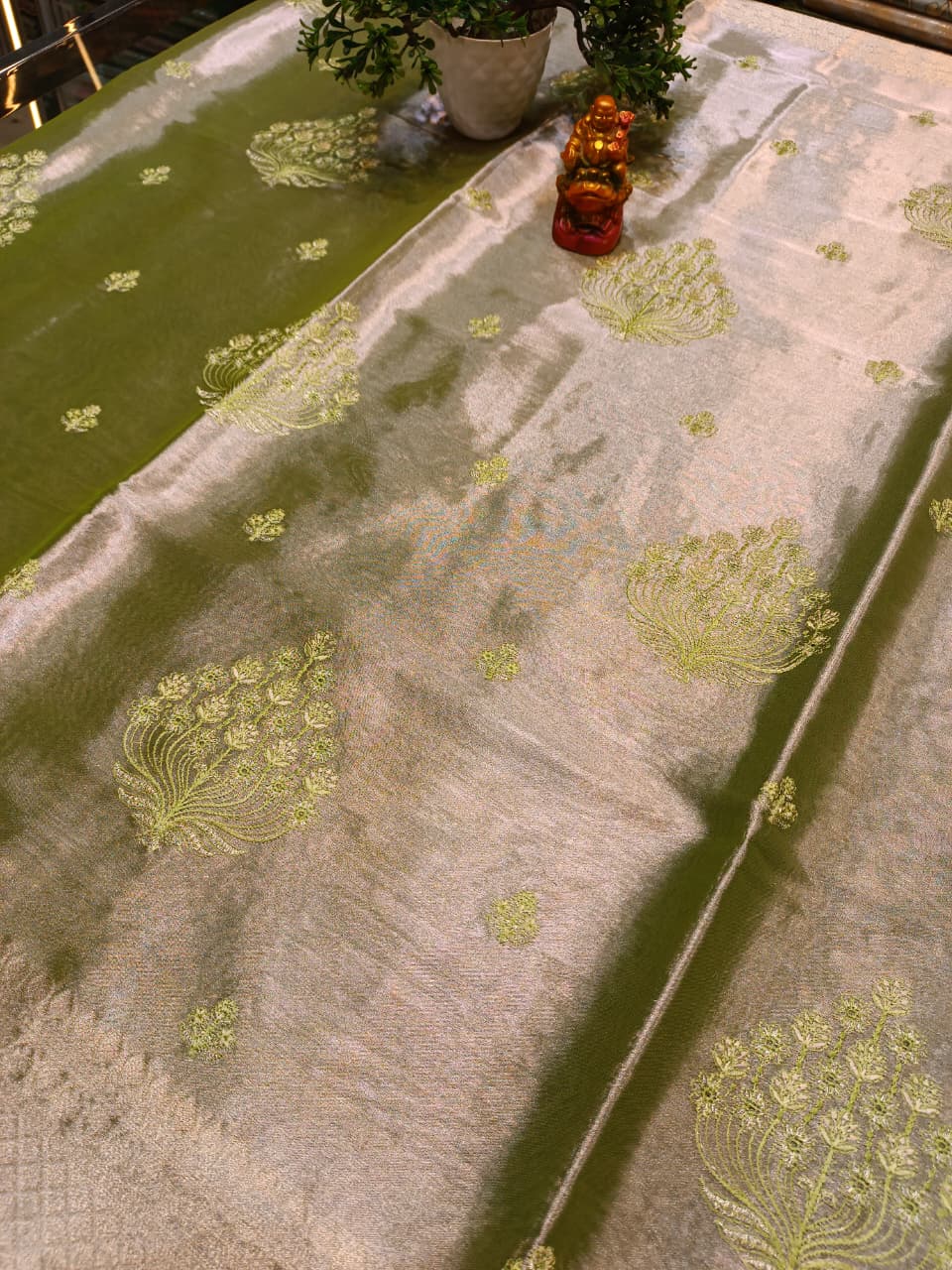 Green Tissue Silk Saree | All Over Shankh Embroidery Sunshade Pattern — Manglam Banaras