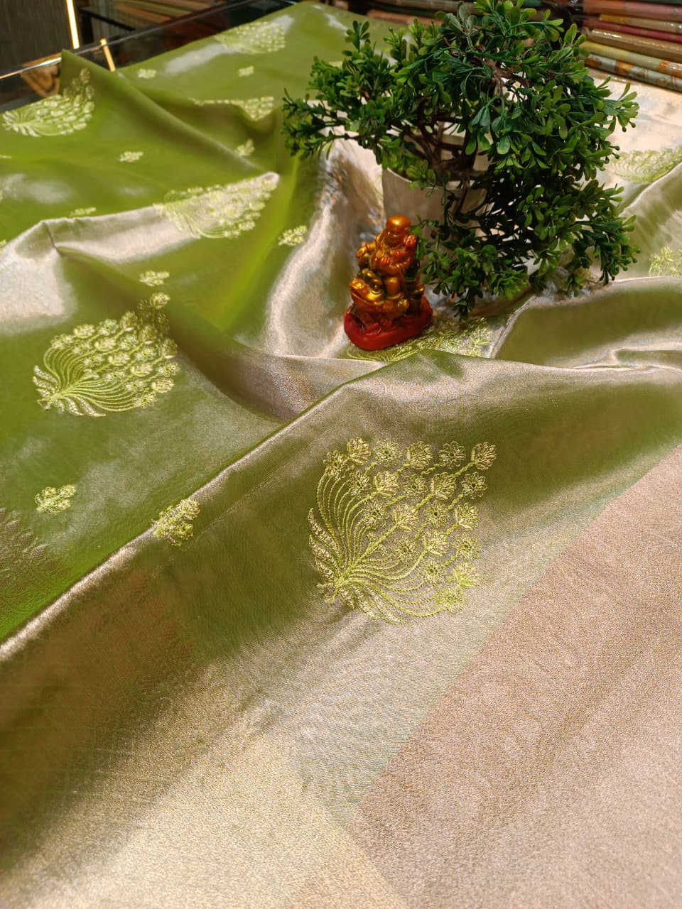 Green Tissue Silk Saree | All Over Shankh Embroidery Sunshade Pattern — Manglam Banaras